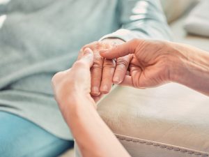 Woman’s hands with arthritis pain